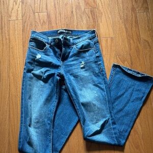 Express Blue Distressed Slim Flare Mid rise Size 6